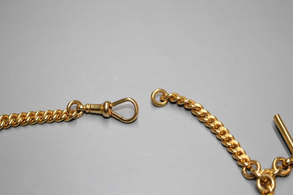 An early 20th century 9ct gold graduated curb link albert, by William Harrison Walter,